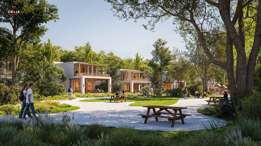 הדמיית היזם / CGI של מדשאת פיקניק מתוכננת ליד הווילות